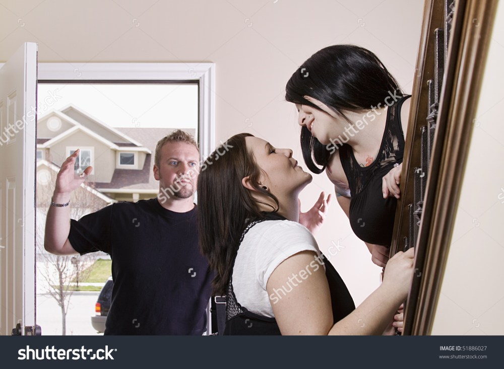 stock-photo-husband-coming-home-finding-his-wife-cheating-with-another-woman-51886027